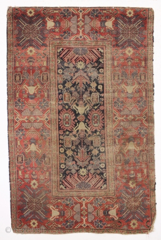 Early persian ferahan rug with an unusual and exceptional border. As found, very very very dirty and with overall low pile as shown. You can see one small old patch in close  ...