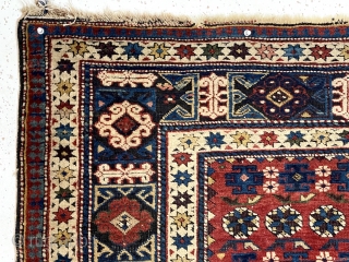 Antique small Caucasian shirvan rug with attractive drawing, good condition and first rate color. A chi chi variant allover field with colorful Kufic border. Overall mostly good even pile with a few  ...