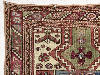 Antique little west Anatolian rug with an interesting design and older colors but with wear and in rough condition. A tribal variation of a double re entry field surrounded by a classic  ...