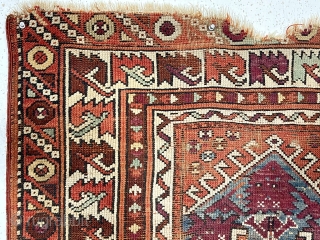 Antique little Turkish village prayer rug, possibly bergama, with some interesting design features and older colors but very rough condition. Appears both madder and cochineal reds used. Attractive ivory “leaf” border. Overall  ...