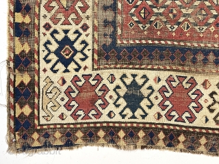 Early Kazak rug with a very unusual field design. The weaver created a novel eye dazzling “candy cane” lattice field and used traditional bold Kazak borders. All very good natural colors featuring  ...