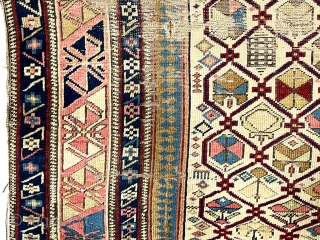 Early ivory ground shirvan prayer rug with unusual elements and extremely saturated natural colors. Some lattice elements are unusual if not unique. Unfortunately the rug is in very rough condition with areas  ...