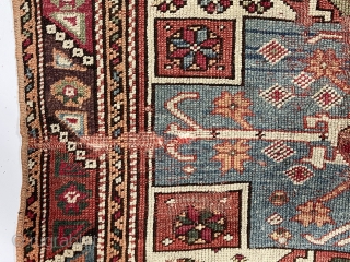 Antique little west Anatolian rug with an interesting design and older colors but with wear and in rough condition. A tribal variation of a double re entry field surrounded by a classic  ...