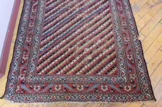 Antique northwest persian or kurdish long rug. Nice design. Fresh off a New England floor. All natural colors with great old purples. Condition as shown, a bit dirty with some wear as  ...