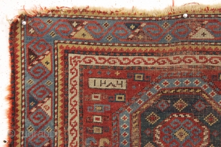 Antique early caucasian prayer rug, dated 1286. Interesting design with an unusual and well drawn border. "As found", very dirty with low pile, some wear and edge roughness as shown. Areas of  ...