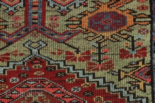 antique little turkish village prayer rug in nearly square in size. Delicately drawn field with an interesting archaic re-entry element. Wide range of colors featuring beautiful greens. Clean and ready for your  ...