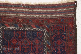 antique baluch prayer rug. Unusual design. all natural colors with nice light blues. no repairs. Nice long kelim ends. small squarish size. 19th c. 3'3" x 4'3"      