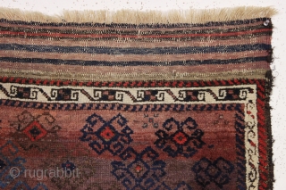 antique turkish knotted baluch rug in pretty good condition with a wild design and great color. All beautiful natural colors including small bits of fiery red highlights. "as found", with allover good  ...