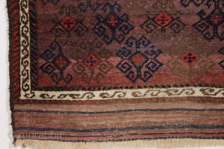 antique turkish knotted baluch rug in pretty good condition with a wild design and great color. All beautiful natural colors including small bits of fiery red highlights. "as found", with allover good  ...