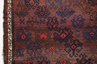 antique turkish knotted baluch rug in pretty good condition with a wild design and great color. All beautiful natural colors including small bits of fiery red highlights. "as found", with allover good  ...