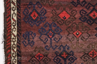 antique turkish knotted baluch rug in pretty good condition with a wild design and great color. All beautiful natural colors including small bits of fiery red highlights. "as found", with allover good  ...