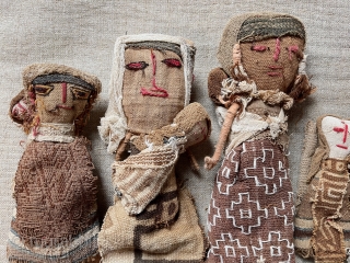 Charming small family of older South American dolls. Constructed using remnant very early fabric. Tallest about 10”.                