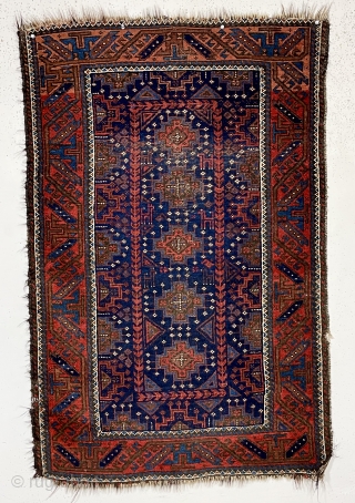 Nice little antique blue ground Baluch rug. Interesting design featuring memling gul like devices and 6 animals. All natural colors including a fine tomato red and electro blue highlights. Fair overall condition  ...