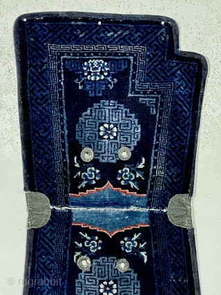Beautiful antique Chinese saddle rug. Attractive rich indigo blue color and vibrant highlights. Overall mostly good thick lustrous pile. Old cloth backing, probably original. Reasonably clean. Late 19th c.  2’3”x 4’7” 