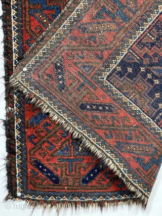 Nice little antique blue ground Baluch rug. Interesting design featuring memling gul like devices and 6 animals. All natural colors including a fine tomato red and electro blue highlights. Fair overall condition  ...