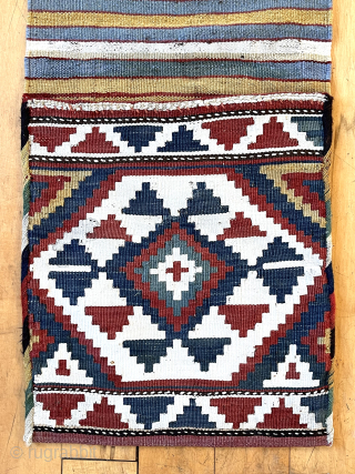 Attractive complete original pair of small kelim bags. Northwest Persian? All good natural colors. Reasonably clean. Whites on the fronts appear to be cotton, wool on backs. Could use a good wash.  ...