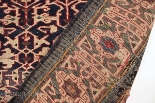 Antique caucasian Konaghend rug. Highest quality weaving. Possibly attacked by wolves. Thick glossy high pile but both end borders damaged. Numerous scattered chewed spots very crudely "repaired". All is not lost as  ...