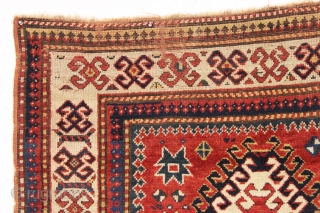 antique kazak rug with an interesting compartment design. All natural colors featuring a good saturated tomato red and nice deep greens. Mostly good pile with some wear and brown oxidation as shown.  ...