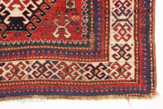 antique kazak rug with an interesting compartment design. All natural colors featuring a good saturated tomato red and nice deep greens. Mostly good pile with some wear and brown oxidation as shown.  ...