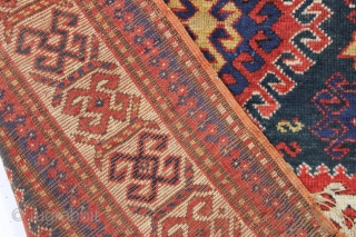 antique kazak rug with an interesting compartment design. All natural colors featuring a good saturated tomato red and nice deep greens. Mostly good pile with some wear and brown oxidation as shown.  ...