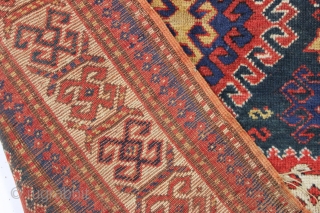 antique kazak rug with an interesting compartment design. All natural colors featuring a good saturated tomato red and nice deep greens. Mostly good pile with some wear and brown oxidation as shown.  ...