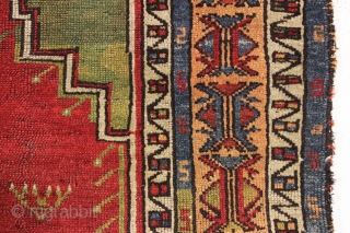 antique anatolian village prayer rug with very attractive colors. In fair condition for an older example with mostly decent pile but some wear and rough edges all around. All natural colors featuring  ...