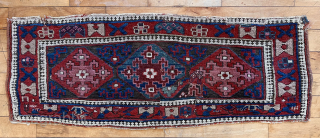 Antique example of an interesting group of likely Kurdish pile weavings. As there are no closure devises I assume these to be a trappings of some sort. Bold drawing and beautiful saturated  ...