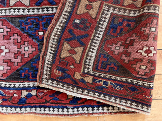 Antique example of an interesting group of likely Kurdish pile weavings. As there are no closure devises I assume these to be a trappings of some sort. Bold drawing and beautiful saturated  ...