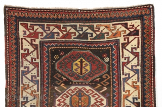 Antique caucasian rug. Unusual field and an interesting rendition of this border type. All natural colors. An unusual palette including a deep natural orange, a strong clear yellow, a dark aubergine and  ...