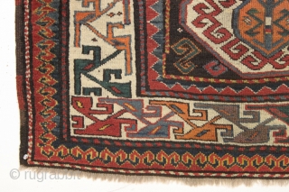 Antique caucasian rug. Unusual field and an interesting rendition of this border type. All natural colors. An unusual palette including a deep natural orange, a strong clear yellow, a dark aubergine and  ...