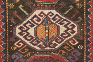 Antique caucasian rug. Unusual field and an interesting rendition of this border type. All natural colors. An unusual palette including a deep natural orange, a strong clear yellow, a dark aubergine and  ...