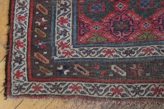 antique kurd bidjar long rug. Interesting and unusual field design. All natural colors. Pile varies from decent medium to low with foundation peeking. No repairs. A charming floor rug, a bit rough  ...