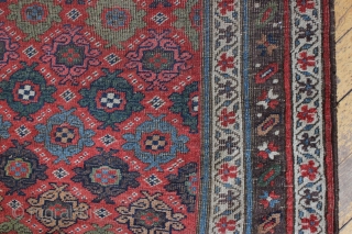 antique kurd bidjar long rug. Interesting and unusual field design. All natural colors. Pile varies from decent medium to low with foundation peeking. No repairs. A charming floor rug, a bit rough  ...