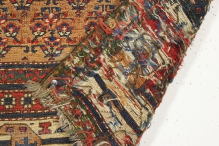 antique soumak bagface. Pretty gold ground. Unusual wide format. Good weave. All natural colors featuring nice old greens and light blues. Clean. I see a small fairly well done repair in center.  ...