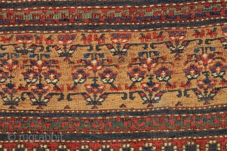 antique soumak bagface. Pretty gold ground. Unusual wide format. Good weave. All natural colors featuring nice old greens and light blues. Clean. I see a small fairly well done repair in center.  ...