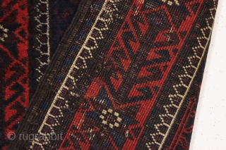 Old baluch rug with mina khani design field and an interesting border. Unusually small size for the type. All good colors featuring a strong ember red. Overall fair condition with mostly good  ...