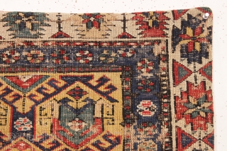 Old soumak rug fragment made into a pillow. All natural colors featuring a nice yellow ground. I opened one end and removed the old stuffing. 19th c. app. 20" sq.   