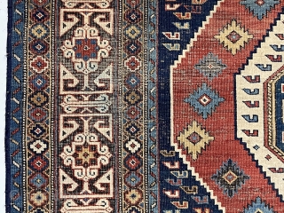 Antique Caucasian shirvan rug with a somewhat uncommon field paired with a nicely drawn Kufic border. Overall even very low pile with scattered wear and oxidation. All natural colors including nice yellow  ...