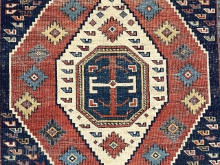 Antique Caucasian shirvan rug with a somewhat uncommon field paired with a nicely drawn Kufic border. Overall even very low pile with scattered wear and oxidation. All natural colors including nice yellow  ...