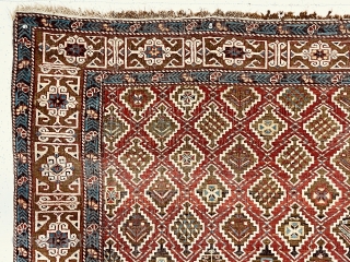 Antique example of an eastern Caucasian type with overall lattice design. Generally referred to as kuba rugs, with depressed weave, this one has light colored selvages usually associated with shirvan rugs not  ...