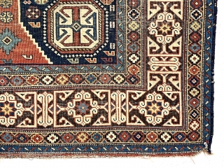 Antique Caucasian shirvan rug with a somewhat uncommon field paired with a nicely drawn Kufic border. Overall even very low pile with scattered wear and oxidation. All natural colors including nice yellow  ...