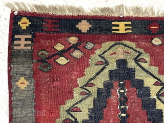 Antique diminutive balkan/pirot prayer kelim. Interesting and attractive weaving in fair condition for this thin fragile type. Elegant floral motifs in field and borders. Scattered slight abrasions and a tiny break here  ...