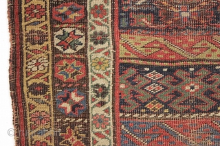 Borders gone wild. Antique kurd bidjar rug with an unusual design. In "as found" condition, VERY dirty and with wear as shown. Looks like good color under the grime. Never seen this  ...