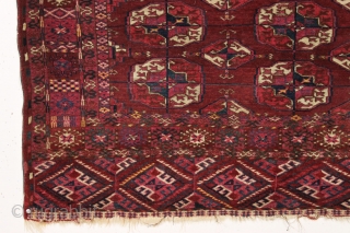 antique tekke rug. Unusual minors and differing skirt panels. All good natural colors including small yellow highlighhts. Beautiful little example in almost original condition. Fine weave and silky wool. Mostly good pile,  ...