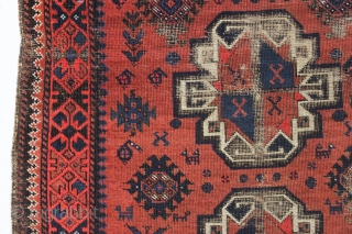 antique little baluch rug. Older example of this interesting type. Thin with wear and heavily oxidized browns as shown. Difficult to photograph but guaranteed all good natural colors. Could use a good  ...