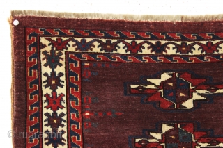 antique turkman yomud torba with an unusually spacious design and overall very good condition. Tight weave and even good glossy pile. All fine natural colors with a rich deep purplish red ground.  ...