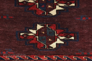 antique turkman yomud torba with an unusually spacious design and overall very good condition. Tight weave and even good glossy pile. All fine natural colors with a rich deep purplish red ground.  ...