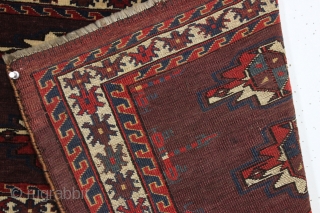 antique turkman yomud torba with an unusually spacious design and overall very good condition. Tight weave and even good glossy pile. All fine natural colors with a rich deep purplish red ground.  ...