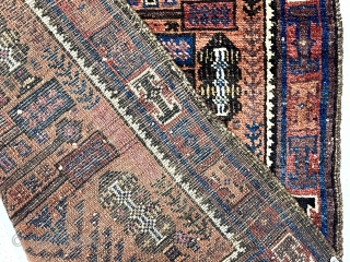 Antique small Baluch rug with a version of this spacious “tree in a vase” design. The unusual aspect of this rug is the diminutive size, probably 1/2 - 2/3 the size of  ...