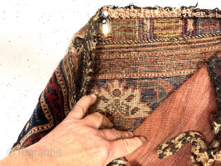 Antique small complete Afshar bag. Interesting uncommon design using part of a stylized Persian Herati motif. Overall good tight pile. Appears to be all natural colors although quite dirty and in need  ...